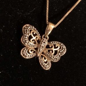 Gold and silver tone butterfly necklace